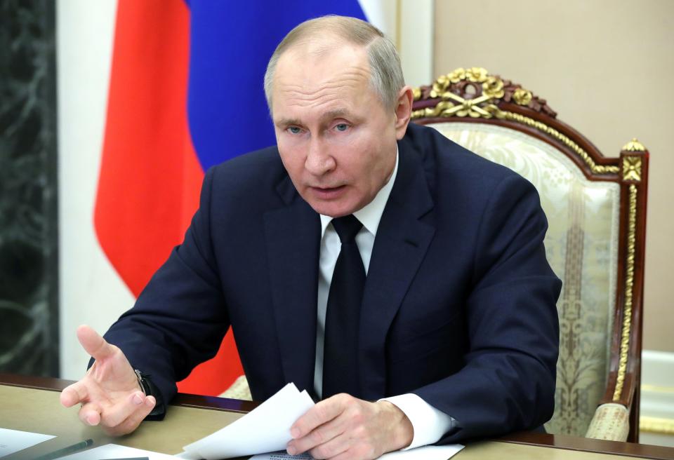 Russian President Vladimir Putin leads a meeting via video conference in Moscow, Russia, Monday, Feb. 1, 2021. (Mikhail Klimentyev, Sputnik, Kremlin Pool Photo via AP)