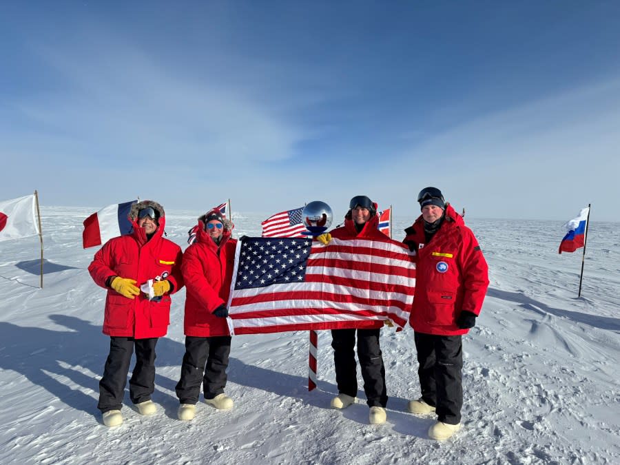 Congressman Womack displays the American flag at the South Pole with Reps. Henry Cuellar (D-TX), Guy Reschenthaler (R-PA), and Tony Gonzales (R-TX).