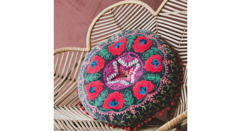 Add a luxurious bohemian cushion like this one from Graham and Green to your sofa. 