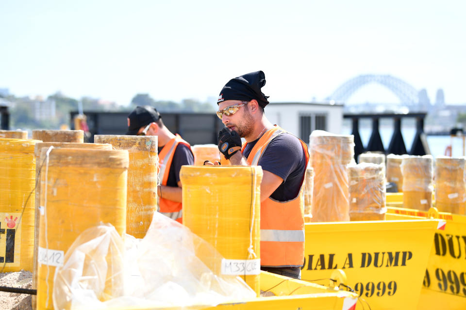 A technician packs fireworks in preparation for the New Year's Eve celebrations at Glebe Island in Sydney, Friday, December 28, 2018.