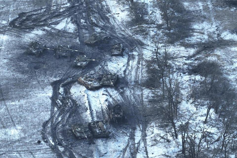 FILE - This image provided by the Ukrainian Armed Forces and taken in February 2023 shows damaged Russian tanks in a field after an attack on Vuhledar, Ukraine. The coal-mining town on Ukraine's eastern front has emerged as a critical hot spot in Donetsk province. Securing the town would give both Ukrainian forces and Russian troops a tactical upper hand in the greater battle for the Donbas region. (Ukrainian Armed Forces via AP, File)