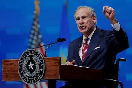 FILE PHOTO: Texas Governor Greg Abbott speaks at the annual National Rifle Association (NRA) convention in Dallas, Texas, U.S., May 4, 2018. REUTERS/Lucas Jackson/File Photo