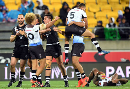 Rugby League World Cup - New Zealand vs Fiji - Wellington Regional Stadium, Wellington, New Zealand - November 18, 2017. Fiji players celebrate after defeating New Zealand in their quarter-final match. REUTERS/Stringer