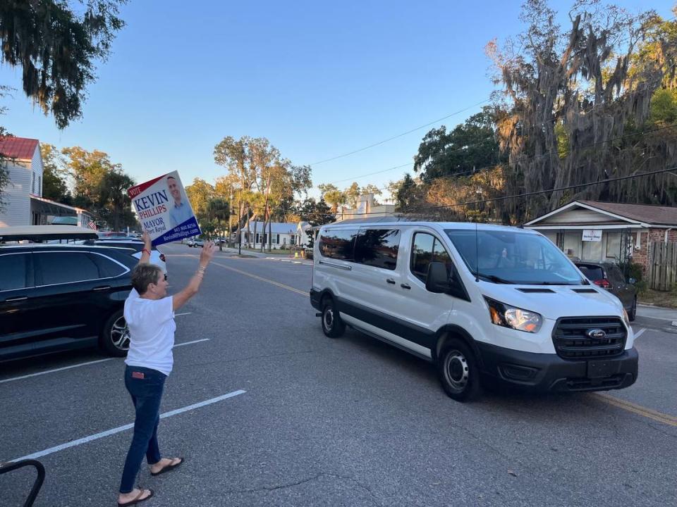 Beth DuBois campaigns on Paris Avenue in Port Royal on behalf of mayoral candidate Kevin Phillips late Tuesday afternoon.