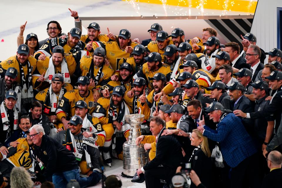Game 5: The Vegas Golden Knights pose with the Stanley Cup after defeating the Florida Panthers 9-3 at T-Mobile Arena.