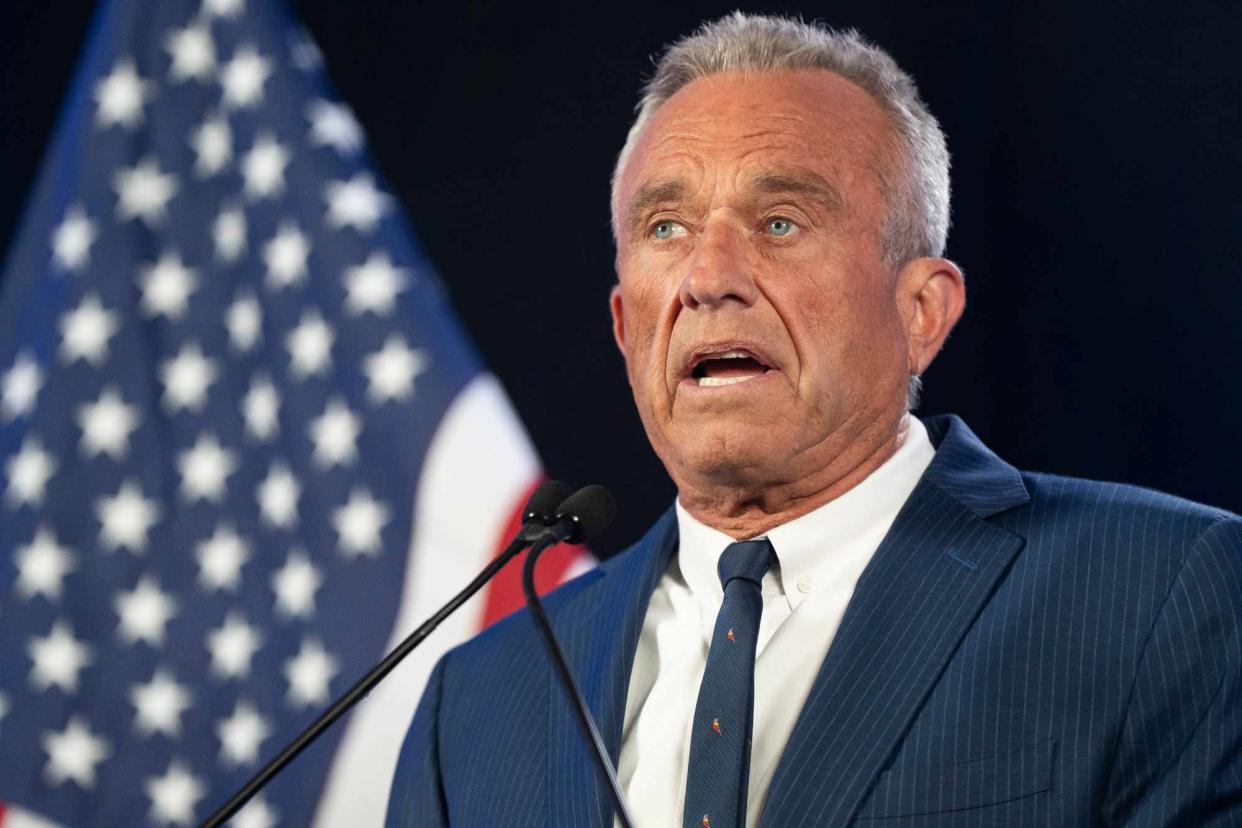 <p>Rebecca Noble/Getty </p> Robert F. Kennedy Jr. suspends his independent presidential campaign on Aug. 23, 2024