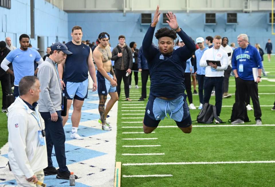 Myles Murphy participates in the broad jump during the Carolina Football Pro Day at UNC Chapel Hill’s Koman Indoor Practice Facility on Thursday, March 28, 2024.