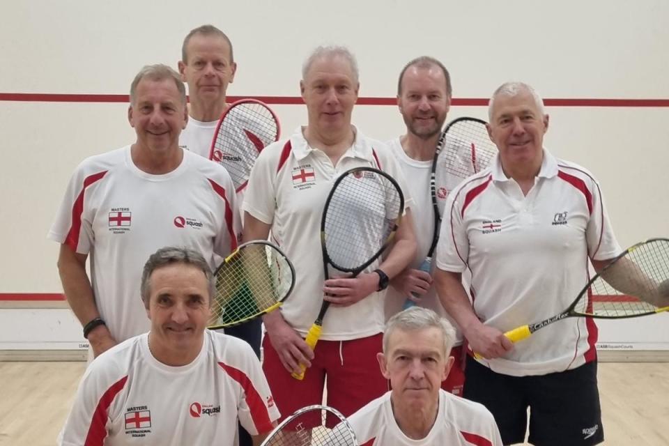 Tom Burton (back row middle) was captain of the England squash masters men’s over-65 team <i>(Image: Submitted)</i>