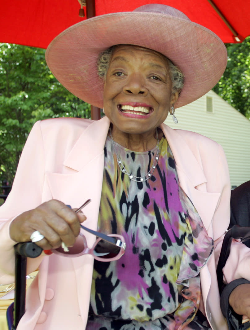 FILE - In this May 20, 2010 file photo, poet and author Maya Angelou smiles at a garden party at her home in Winston-Salem, N.C. Angelou's latest book, memoir "Mom & Me & Mom," is a sweet ode to "Lady," her mother Vivian Baxter, and "Momma," her paternal grandmother Annie Henderson. (AP Photo/Nell Redmond, file)