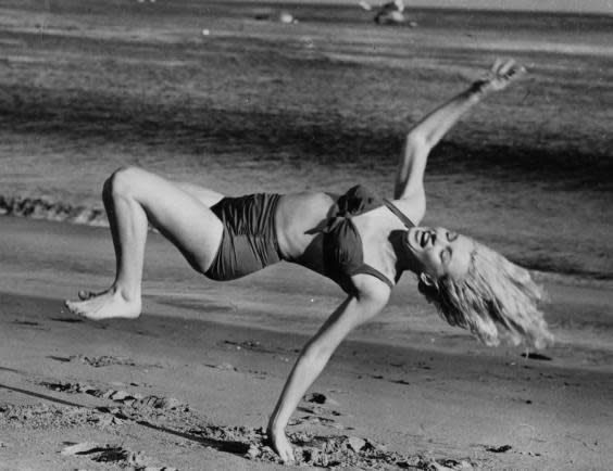 Marilyn Monroe having fun on the beach near her Hollywood home during a break from filming (Photo by L J Willinger/Getty Images)