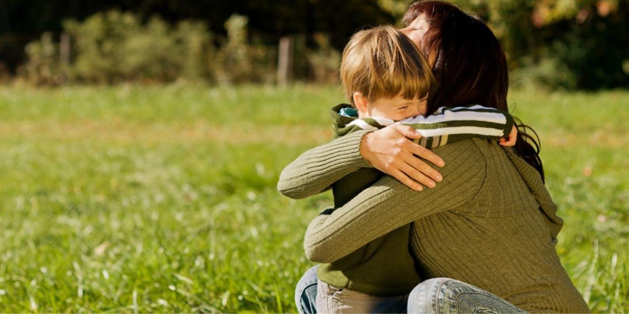 child hugging his mom