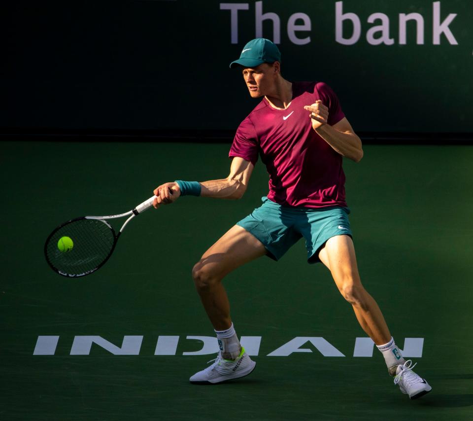 Jannik Sinner of Italy hits to Taylor Fritz of the United States during their quarterfinal match at the BNP Paribas Open at the Indian Wells Tennis Garden in Indian Wells, Calif., Thursday, March 16, 2023. 
