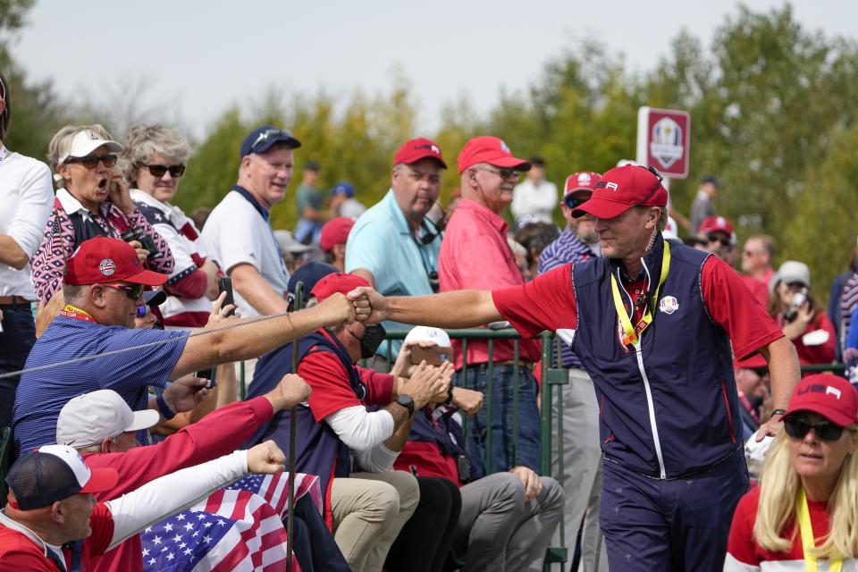 Team USA captain Steve Stricker greets fans on the second hole during a Ryder Cup singles match at the Whistling Straits Golf Course Sunday, Sept. 26, 2021, in Sheboygan, Wis. (AP Photo/Jeff Roberson)