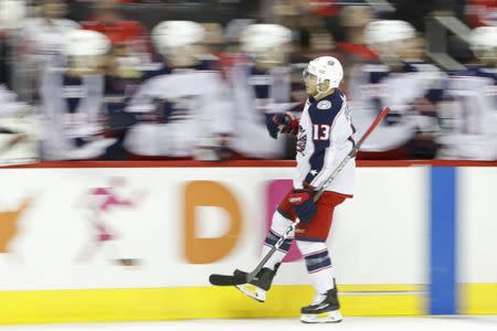 Jan 12, 2019; Washington, DC, USA; Columbus Blue Jackets right wing Cam Atkinson (13) celebrates with teammates after scoring a goal against the Washington Capitals in the first period at Capital One Arena. Mandatory Credit: Geoff Burke-USA TODAY Sports
