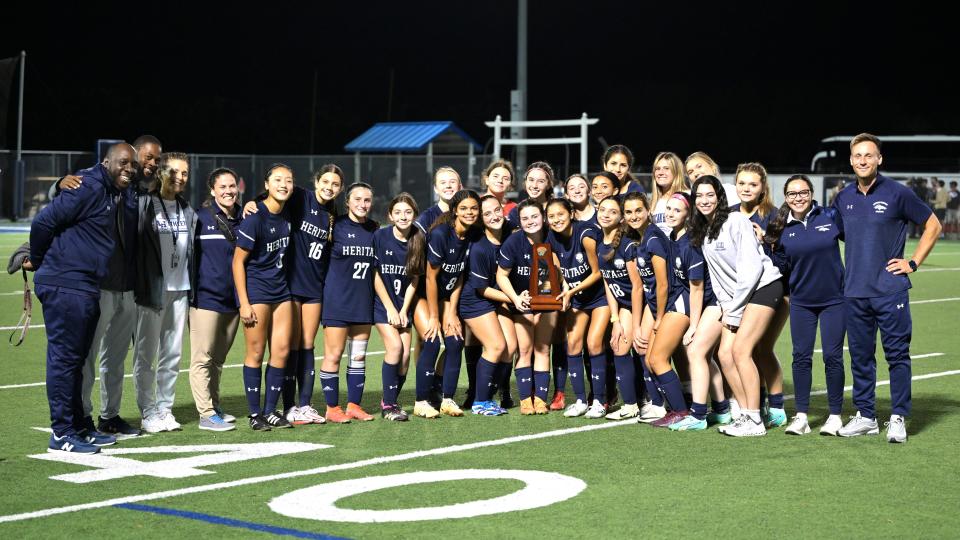 The American Heritage-Delray girls soccer team poses in celebration of their regional championship on Feb. 14, 2024.