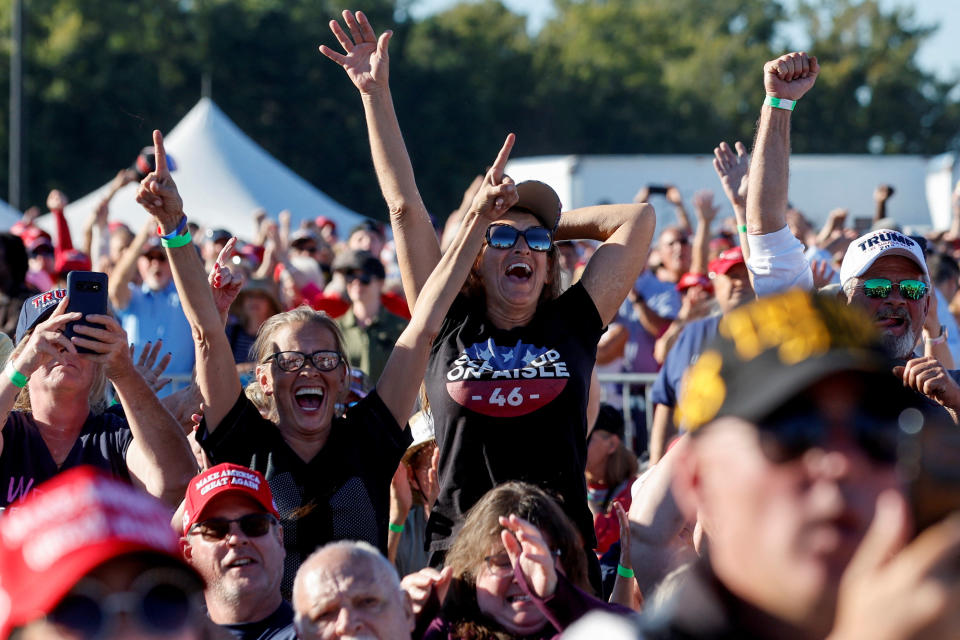 Supporters cheer at former President Donald Trump's rally for North Carolina Senate GOP candidate Ted Budd in Wilmington, N.C., in 2022. 