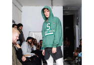In this Friday, Sept. 13, 2019 photo provided by Bstroy, models at a show for fashion brand Bstroy wear hoodies emblazoned with the names of schools touched by mass shootings at an apartment in the Soho neighborhood of Manhattan in New York. The hoodies have created a backlash from critics who say they glamorize violence and aim to profit from tragedy. Bstroy co-founder Dieter Grams says the hoodies are an effort to bring attention to gun violence and are not for retail sale. (Bstroy via AP)