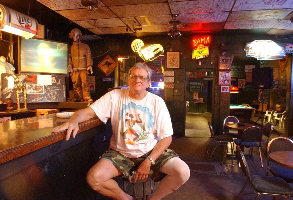 Harry Hammonds sits on stool at Harry's Bar in this 2004 file photo.