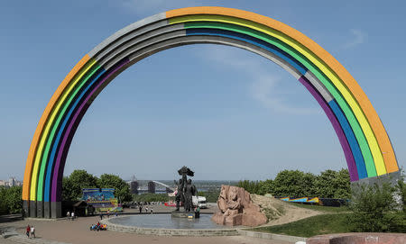 A Soviet monument, "Arch of the Friendship of Nations", painted with rainbow colours, in celebration of diversity ahead of the Eurovision Song Contest, is seen in central Kiev, Ukraine May 4, 2017. REUTERS/Gleb Garanich