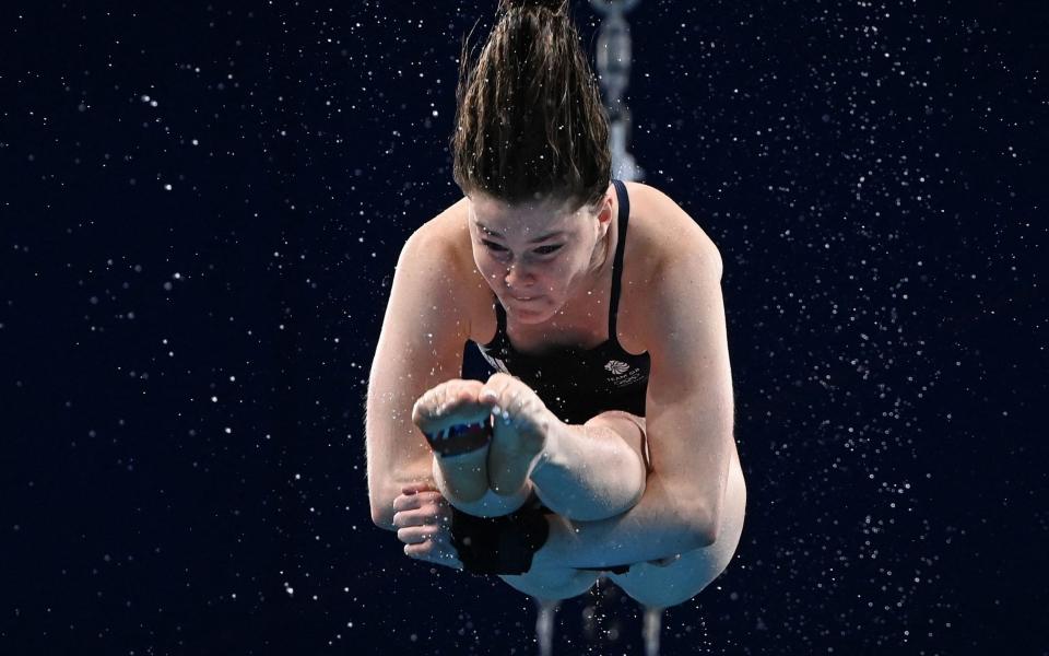 Andrea Spendolini-Sirieix pictured mid-dive - AFP