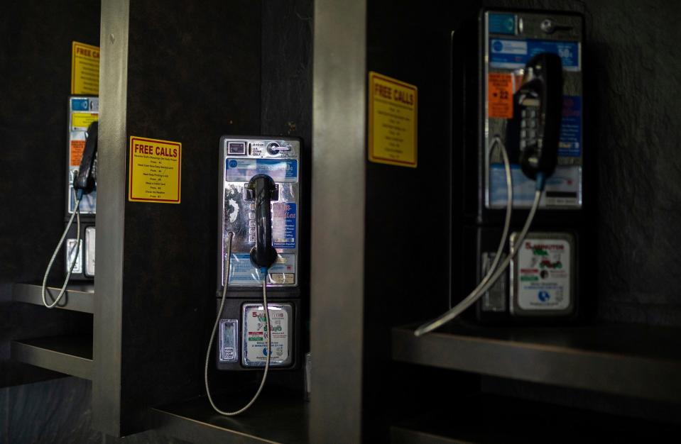 Three pay phones sit inside the Frank Murphy Hall of Justice in Detroit on Dec. 9, 2023.