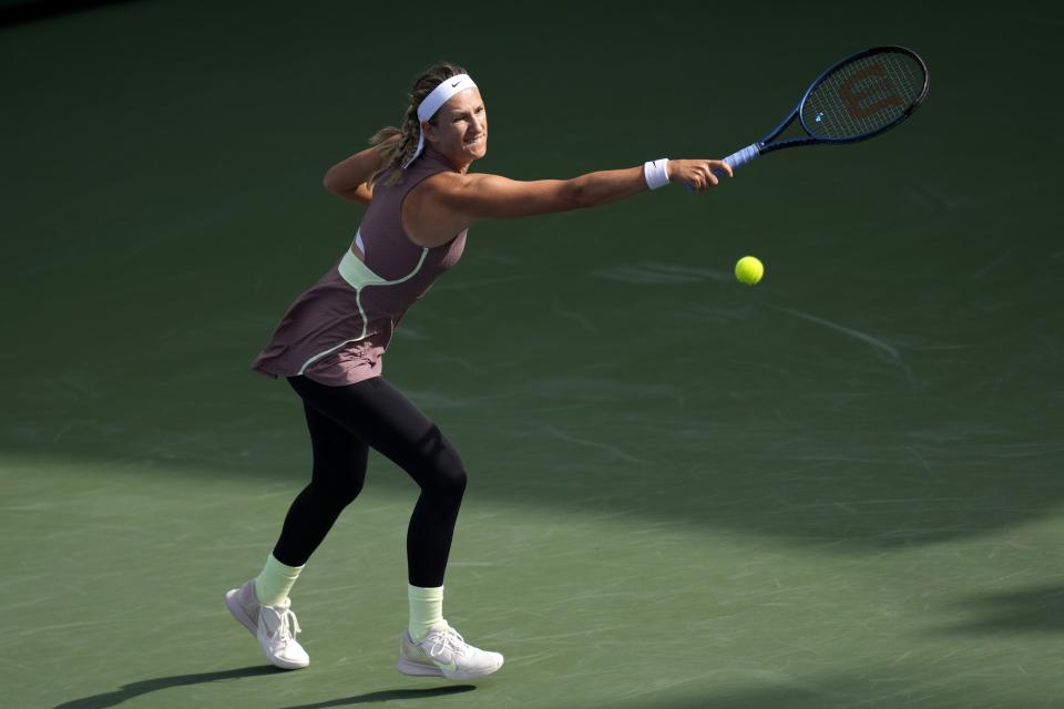 Victoria Azarenka returns the ball to Elena Rybakina of Kazakhstan during a match of the Dubai Duty Free Tennis Championships in Dubai, United Arab Emirates, Monday, Feb. 19, 2024. (AP Photo/Kamran Jebreili)