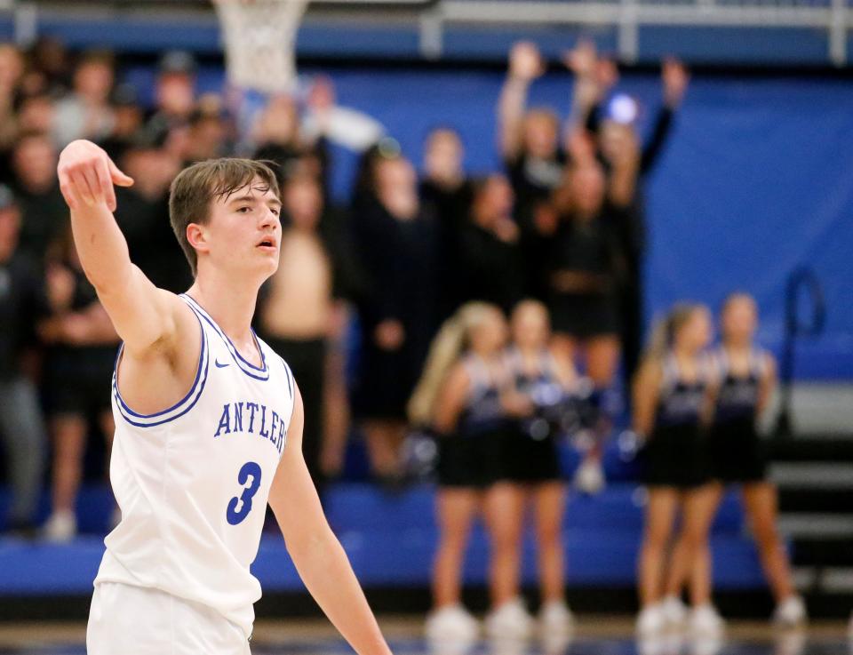 Deer Creek's Hudson Linsenmeyer celebrates after a 3-point basket against Edmond Memorial during the championship game at the Bruce Gray Tournament at Deer Creek in Edmond on Jan. 21.
