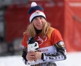 Snowboard - Pyeongchang 2018 Winter Olympics - Women's Parallel Giant Slalom Finals - Phoenix Snow Park - Pyeongchang, South Korea - February 24, 2018 - Gold medallist Ester Ledecka of Czech Republic smiles. REUTERS/Mike Blake