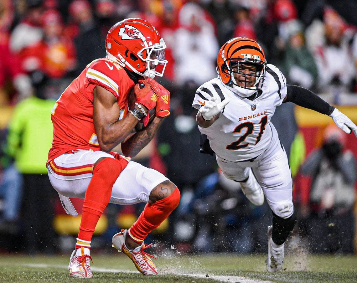 Kansas City Chiefs wide receiver Marquez Valdes-Scantling pulls in a pass for a touchdown in the third quarter while Cincinnati Bengals cornerback Mike Hilton attempts to defend during the AFC Championship Game Sunday, Jan. 29, 2023, at GEHA Field at Arrowhead Stadium.