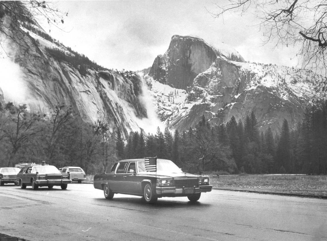The royal motorcade travels out of Yosemite Valley under the snow-capped visage of Half Dome during Queen Elizabeth II’s 1983 visit to Yosemite National Park. Fresno Bee archive