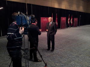 Former prime minister Paul Martin makes the early rounds at the Liberal Leadership Convention on Saturday, April 6, 2013.