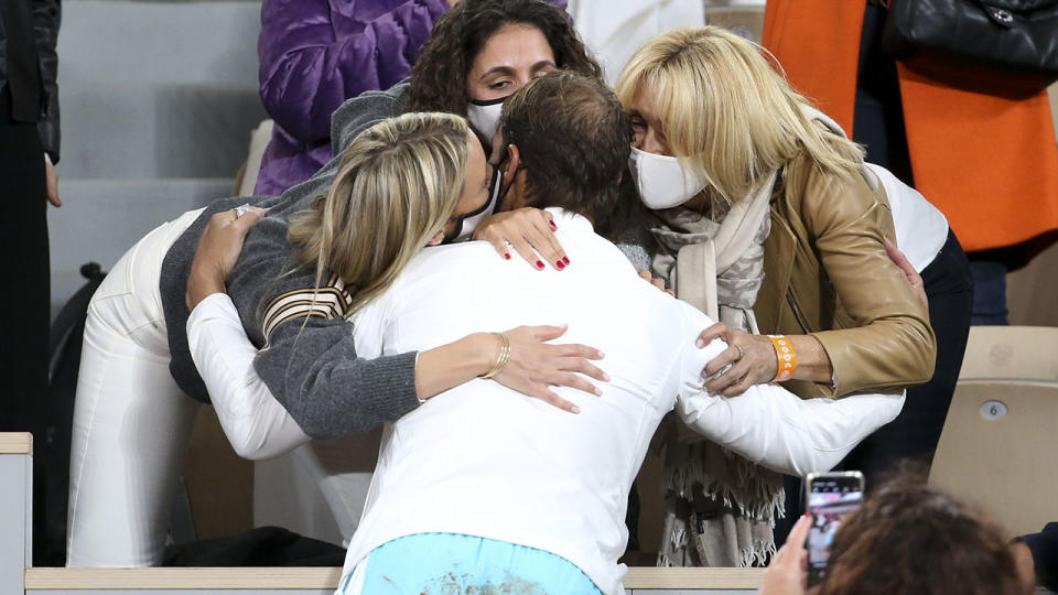 Rafael Nadal, pictured here celebrating with sister Maria Isabel, wife Xisca Perello and mother Ana Maria Parera.