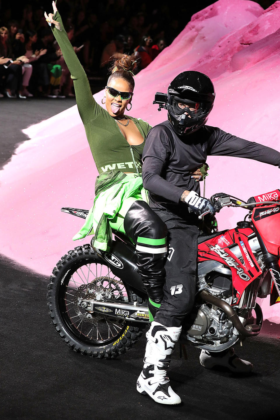 <p>Rihanna never does anything quite like anyone else. For example, the star’s New York Fashion Week presentation for her Fenty x Puma line featured some extreme sports, including RiRi on a motorcycle. (Photo: Paul Morigi/WireImage) </p>