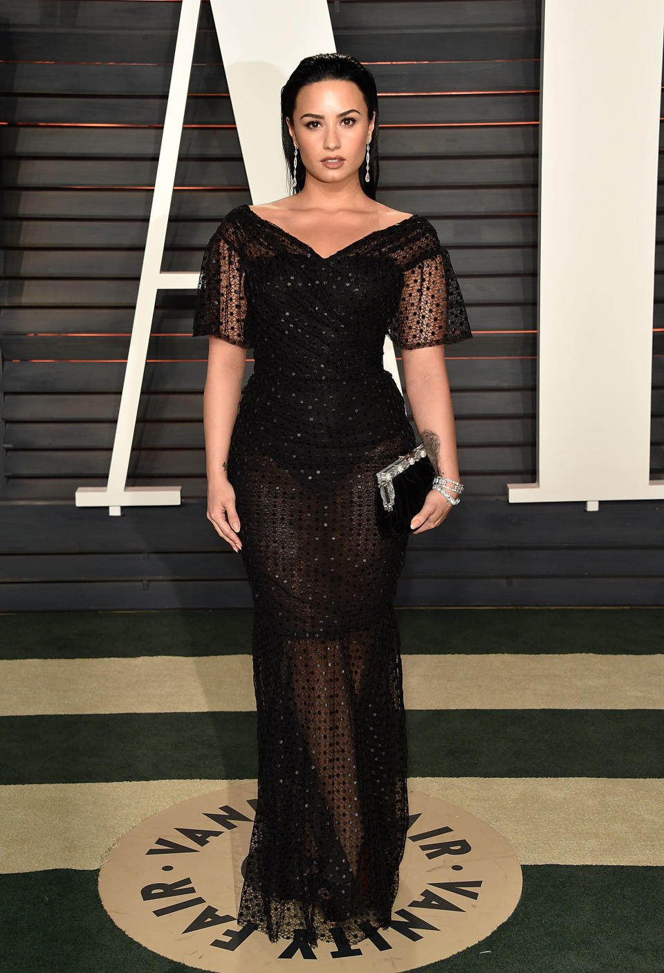 Demi Lovato arrives at the 2016 Vanity Fair Oscar Party in Beverly Hills, California.