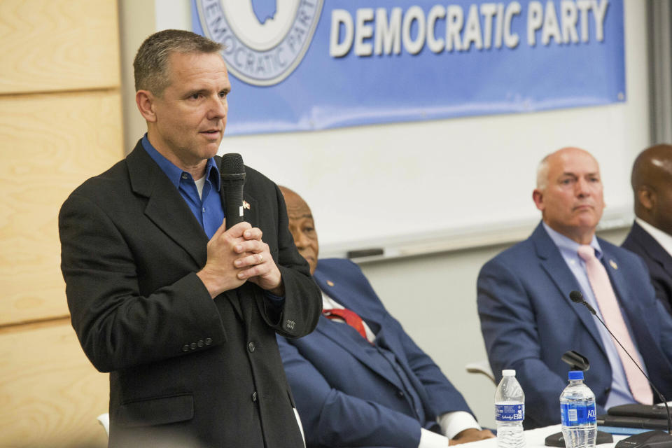 This photo taken April 15, 2019, shows Richard Bew speaking during a forum held by the Pitt County Democratic Party for the Third Congressional District candidates in Winterville, N.C. U.S. Rep. Walter Jones Jr.'s long-held congressional seat in North Carolina was expected to be up for grabs soon, but it happened more quickly than most people anticipated. Months after the Republican announced his 2018 campaign would be his last, Jones' health faded. He died in February at age 76. Jones' death drew people from both sides of the aisle to praise his commitment to his constituents, his faith and his willingness to buck party leadership regardless of political consequences, such as when he opposed the Iraq War. It also drew more than two dozen candidates from four parties into an accelerated, off-year special election to replace him in the GOP-leaning 3rd Congressional District. (Juliette Cooke/The Daily Reflector via AP)