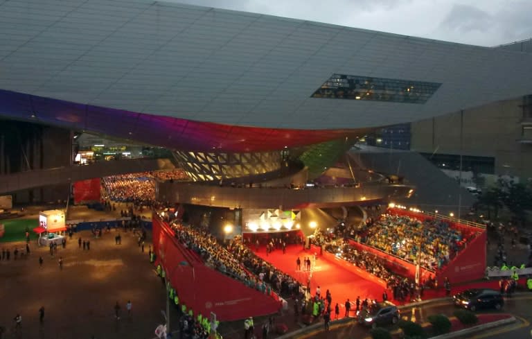 Attendees are seen arriving for the opening ceremony of the Busan International Film Festival (BIFF), on October 1, 2015