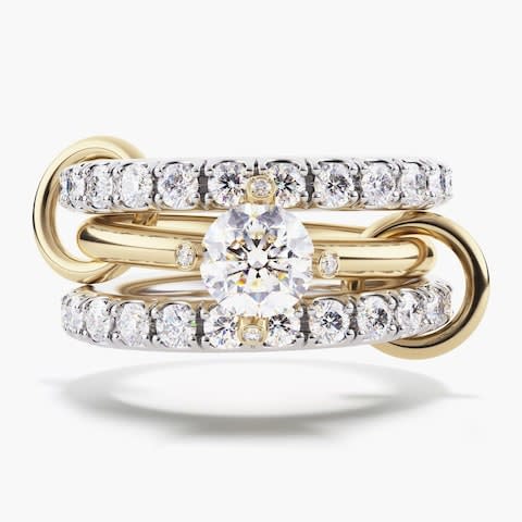 Spinelli Kilcollin Amor ring in 18-carat yellow and white gold with pavé-set white diamonds, micro-pavé prongs and a one-carat white diamond with yellow gold connectors