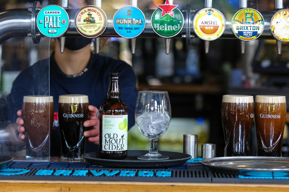 tax LONDON, UNITED KINGDOM - 2021/04/12: A barmaid prepares pints of Guinness in a pub in London. (Photo by Dinendra Haria/SOPA Images/LightRocket via Getty Images)