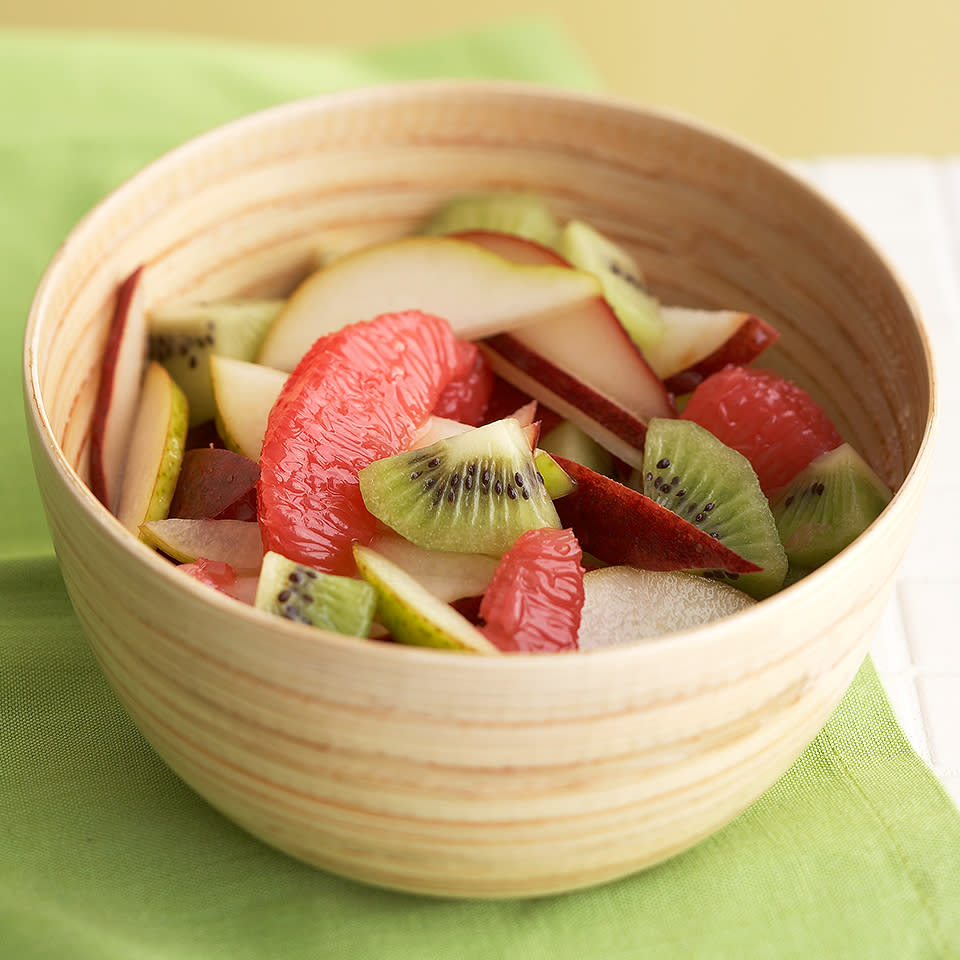 <p>Crisp pear, juicy grapefruit, and melt-in-your-mouth kiwifruit are lightly spritzed with a simple honey-balsamic dressing in this deliciously refreshing salad, ready in just 10 minutes. Serve it alongside your main meal, or save it for dessert! <a href="https://www.eatingwell.com/recipe/269536/honey-balsamic-fruit-salad/" rel="nofollow noopener" target="_blank" data-ylk="slk:View Recipe" class="link ">View Recipe</a></p>