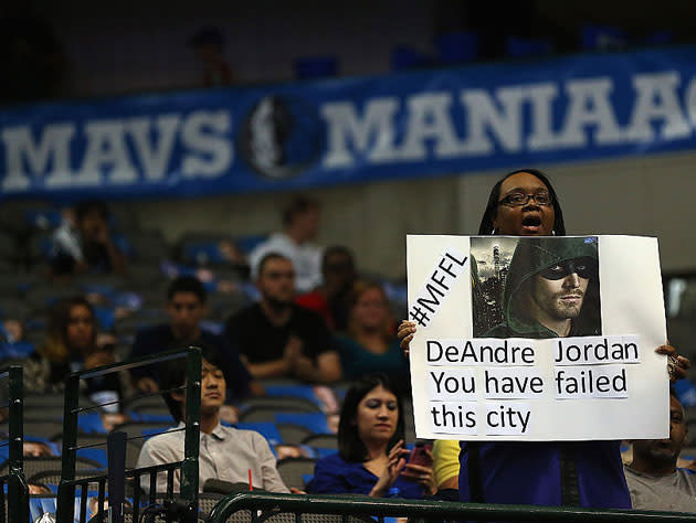 A Mavericks fan reacts to the 2015 offseason. (Getty Images)