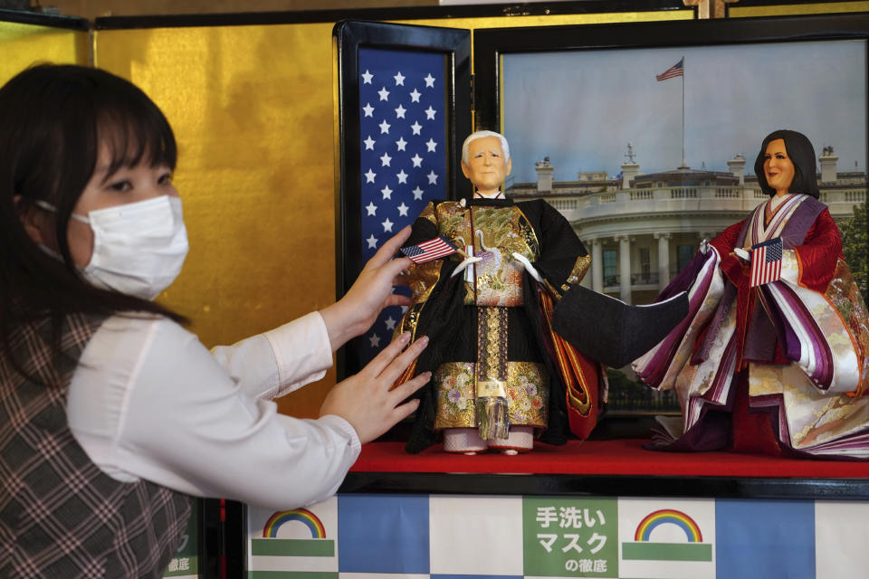 "Hina" dolls depicting U.S. President Joe Biden and Vice President Kamala Harris, right, are displayed for Girls' Day celebrations at Kyugetsu, a Japanese traditional doll company, Wednesday, Jan. 27, 2021 in Tokyo. The dolls are among others adorned with images based on persons of the year. March 3 is celebrated as Girls' Day to pray for the vigorous growth of girls in the family. (AP Photo/Eugene Hoshiko)