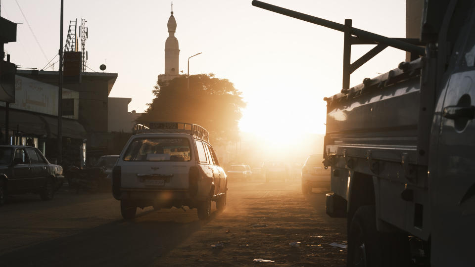 4x4 truck driving into bright sunlight in Egypt.