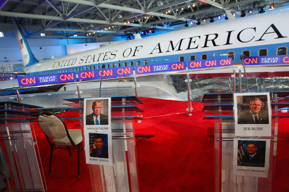 Photos of Donald Trump, president and chief executive of Trump Organization Inc. and 2016 Republican presidential candidate, not pictured, and Jeb Bush, former governor of Florida and 2016 Republican presidential candidate, not pictured, are seen on podiums past Air Force One during a walk-through ahead of the Republican presidential debate at the Ronald Reagan Presidential Library in Simi Valley, California, on Sept. 16, 2015. The main debate of the top 11 GOP contenders in the polls follows the "kids' table" debate of candidates who didn't make the cut.