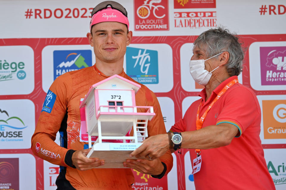 GRUISSAN FRANCE  JUNE 15 Marijn van den Berg of The Netherlands and Team EF EducationEasyPost celebrates at podium as Red Leader Jersey winner during the 47th La Route DOccitanieLa Depeche Du Midi 2023 Stage 1 a 1843km stage from Narbonne to Gruissan on June 15 2023 in Gruissan France Photo by Luc ClaessenGetty Images