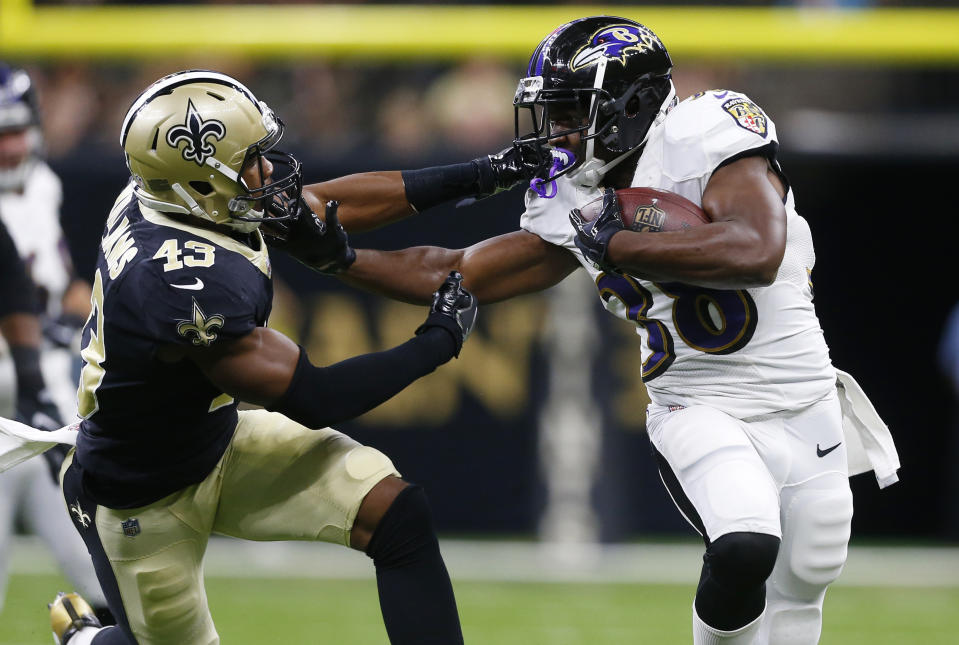 New Orleans Saints safety Marcus Williams (43) attempts to tackle Baltimore Ravens running back <a class="link " href="https://sports.yahoo.com/nfl/players/26455" data-i13n="sec:content-canvas;subsec:anchor_text;elm:context_link" data-ylk="slk:Bobby Rainey;sec:content-canvas;subsec:anchor_text;elm:context_link;itc:0">Bobby Rainey</a> (38), during the first half of an NFL preseason football game, Thursday, Aug. 31, 2017, in New Orleans. (AP Photo/Butch Dill)