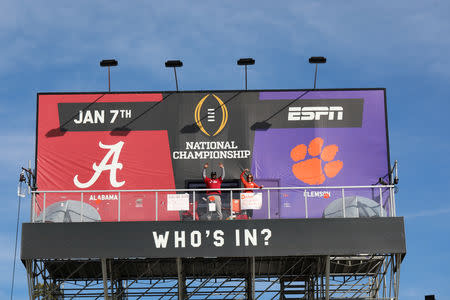 Clemson Tigers fan Nancy Volland and Alabama Crimson Tide supporter Llyas Ross Sr., who have been living on ESPN Billboard ahead of Monday's national championship game as part of an ESPN contest since December 26, 2018, are seen in this photo taken downtown San Jose, California, U.S., on January 3, 2019. Picture taken January 3, 2019. Courtesy ESPN/Handout via REUTERS