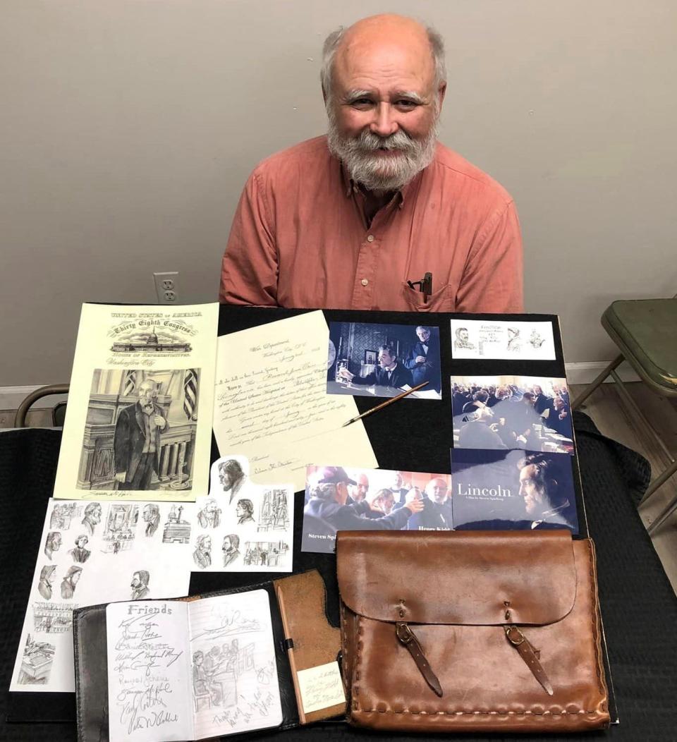 Artist/Actor Henry Kidd displays a memory board he created to remember his movie-making moment when he starred in Steven Spielberg's "Lincoln," filmed partly in Petersburg and Richmond.