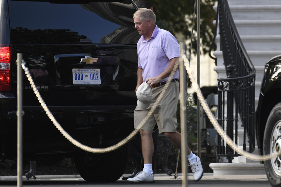 Sen. Lindsey Graham, R-S.C., gets out of the car after returning to the White House in Washington, Saturday, Sept. 28, 2019, with President Donald Trump after spending the day playing golf. (AP Photo/Susan Walsh)