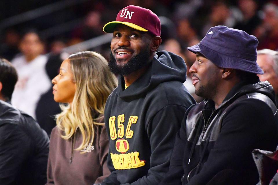 <p>Brian Rothmuller/Icon Sportswire via Getty</p> Lebron James looks on during the college basketball game between the Arizona State Sun Devils and the USC Trojans on March 7, 2024