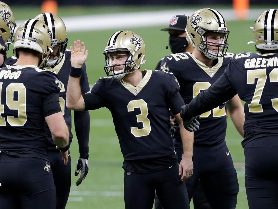 Wil Lutz celebrates after a field goal against the Tampa Bay Buccaneers.